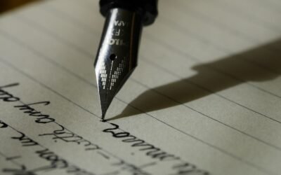 Handwriting with fountain pen on notepad
